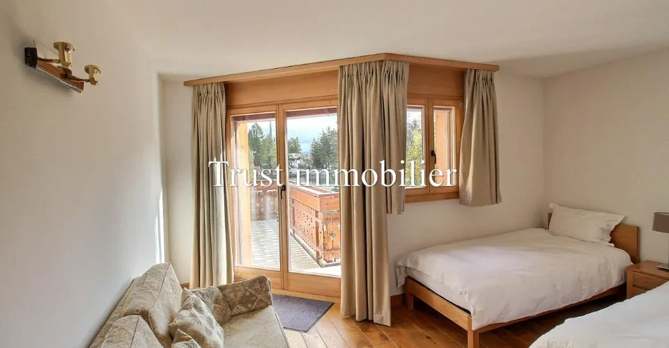5003. Double appartement en RdC au centre de Crans – Foto 7 von 13