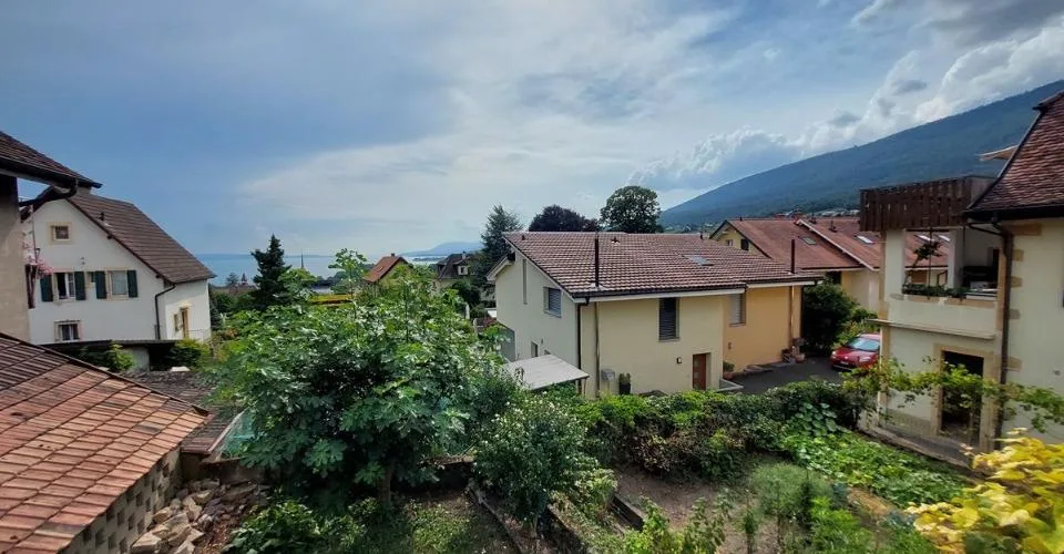 Maison villageoise avec jardin offrant deux appartements et un espace commercial – photo 4 sur 13