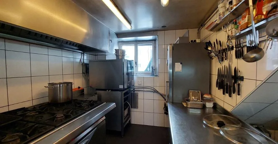 Maison idéalement située au centre-ville, abritant un restaurant connu sous l'enseigne « Le Faucheur »