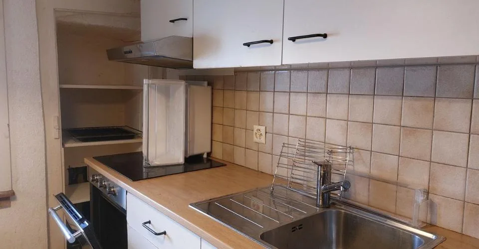 Maison idéalement située au centre-ville, abritant un restaurant connu sous l'enseigne « Le Faucheur »