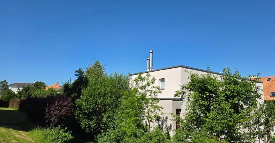 Appartement en attique avec terrasse, garage double et place de parc extérieure