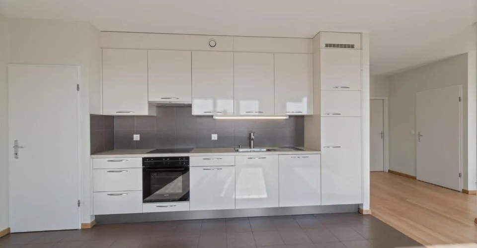 Exclusivité : attique traversant de 5 pièces avec généreuse terrasse et balcon