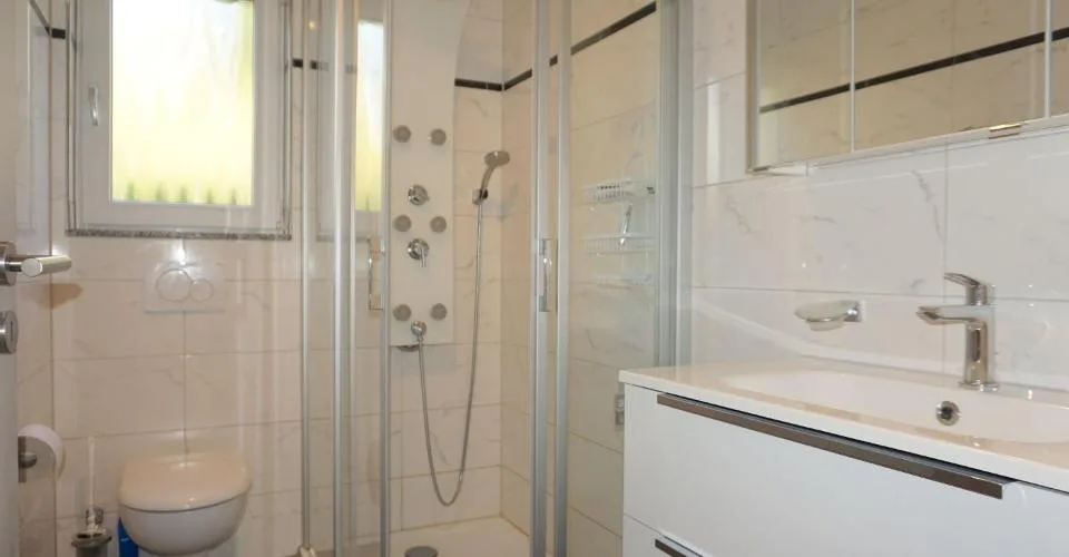 ARI-262 - Magnifique rez-de-jardin de 5,5 pièces dans une maison de standing à 2 logements