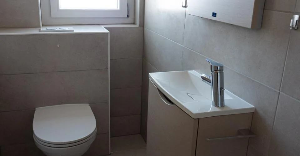 Superbe appartement rénové de 3½ pièces avec balcon, garage et vue dégagée