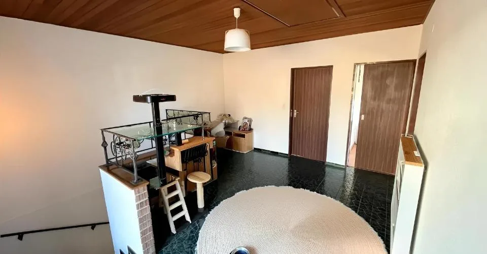 Charmante maison mitoyenne de 4 pièces avec terrasse, cave voûtée et garage à Grandfontaine