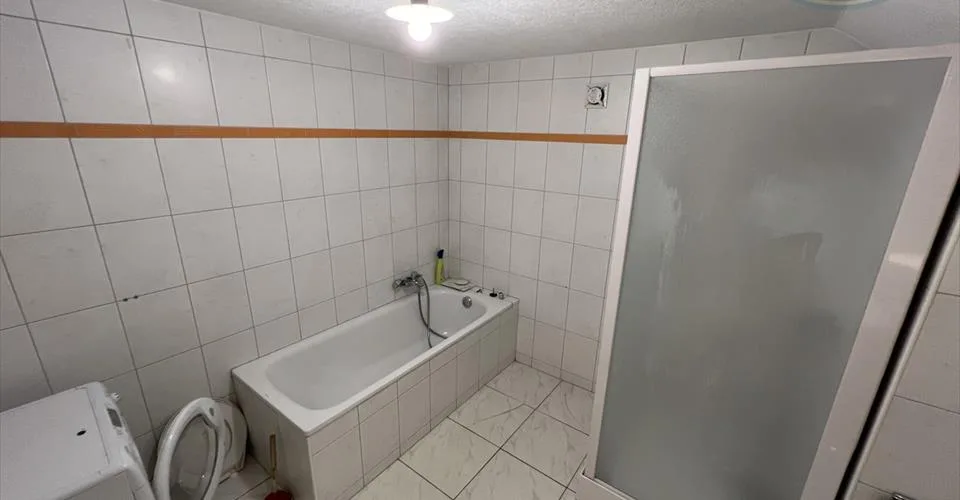 Maison de trois appartements à Courgenay avec grange – photo 5 sur 13