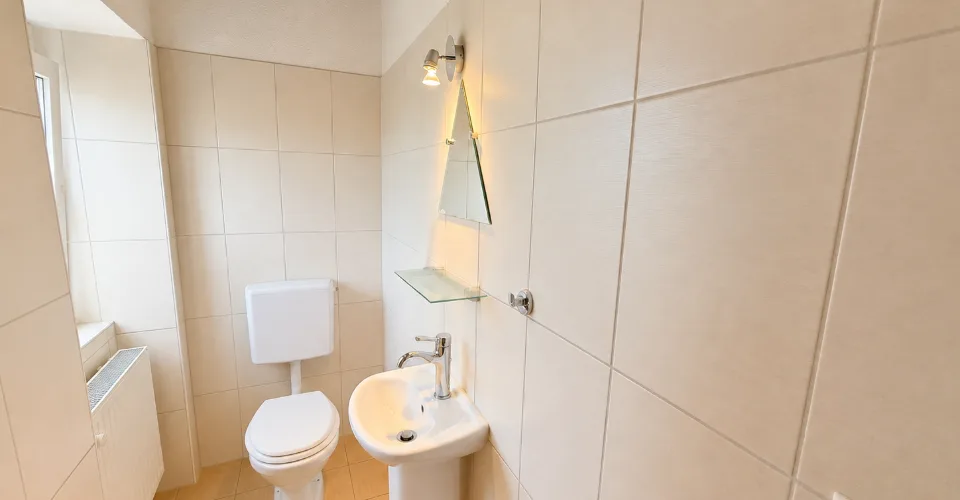 Charmante maison mitoyenne de 4,4 pièces avec jardin, cave voûtée et garage à Grandfontaine