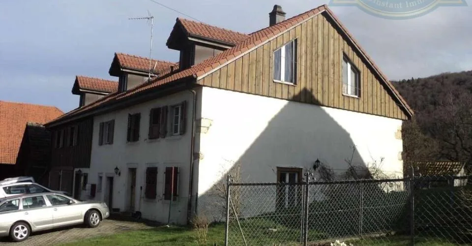 Immeuble de rendement entièrement loué