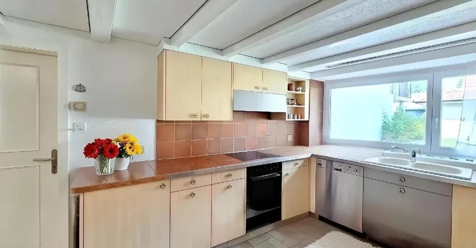 Appartement tout rénové de 4,5 pièces avec balcon et jardin