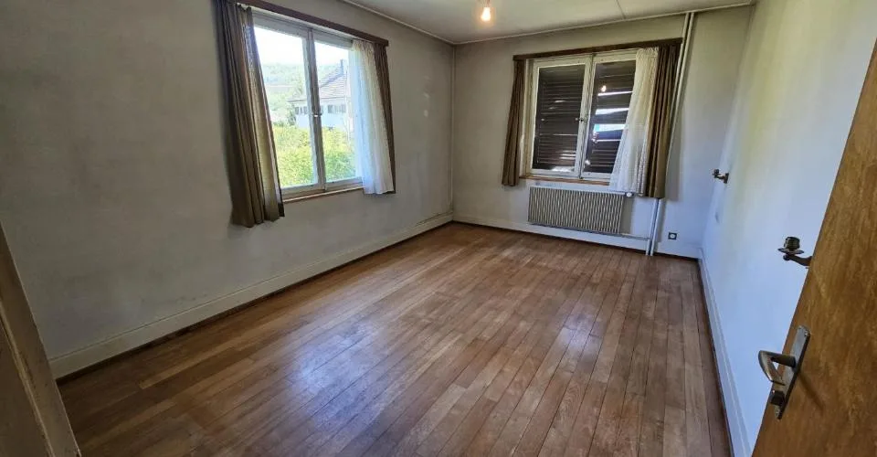 Maison familiale à rénover de 6.5 pièces à vendre à Courrendlin