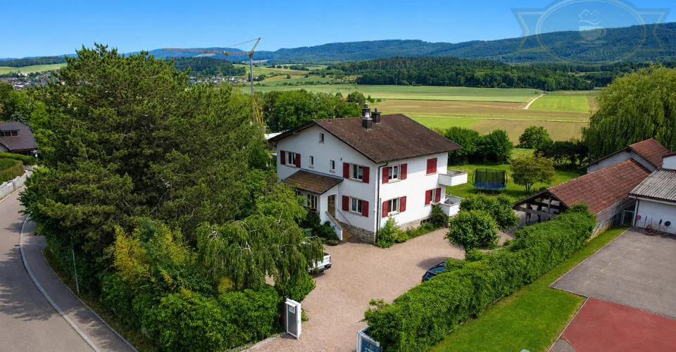 Maison de deux logements avec grande parcelle et pavillon aménageable