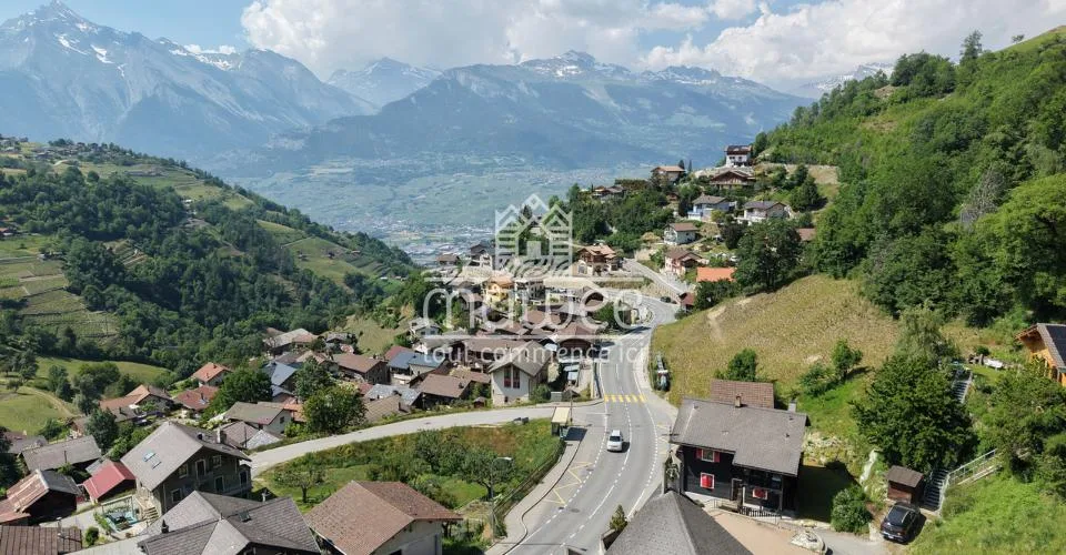 Terrain de 1682 m2 avec permis en force pour 3 chalets