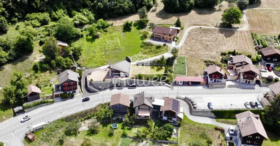 Terrain de 1682 m2 avec permis en force pour 3 chalets