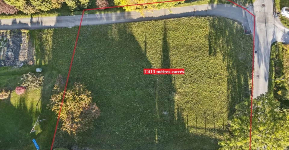 Grande parcelle à bâtir au coeur d'un quartier résidentiel