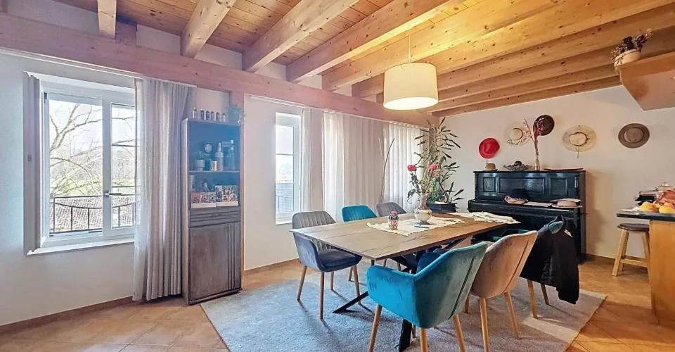 Immeuble d'habitation avec café-restaurant au coeur de la Broye