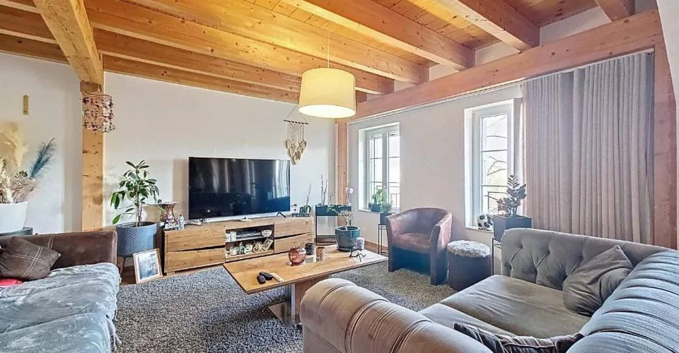 Immeuble d'habitation avec café-restaurant au coeur de la Broye