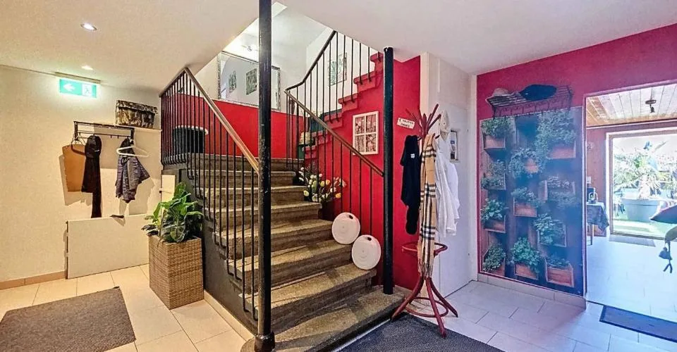 Immeuble d'habitation avec café-restaurant au coeur de la Broye