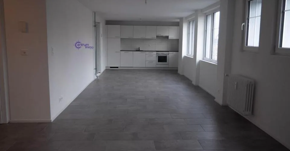 Immeuble comprenant 7 appartements ainsi qu'un local commercial
