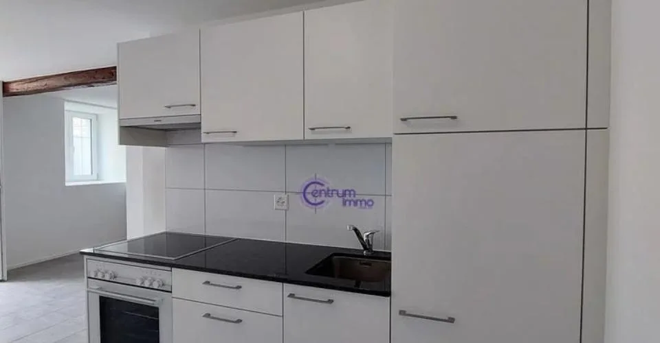 Immeuble comprenant 7 appartements ainsi qu'un local commercial