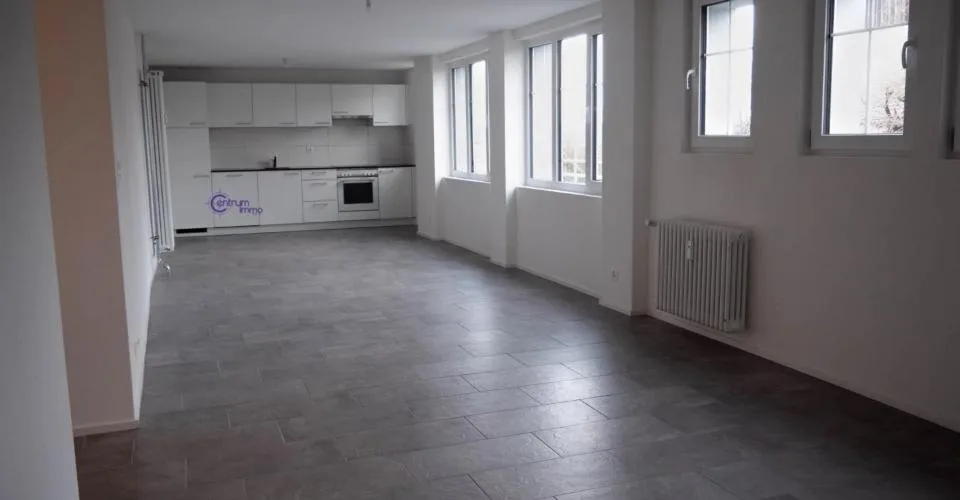 Immeuble comprenant 7 appartements ainsi qu'un local commercial
