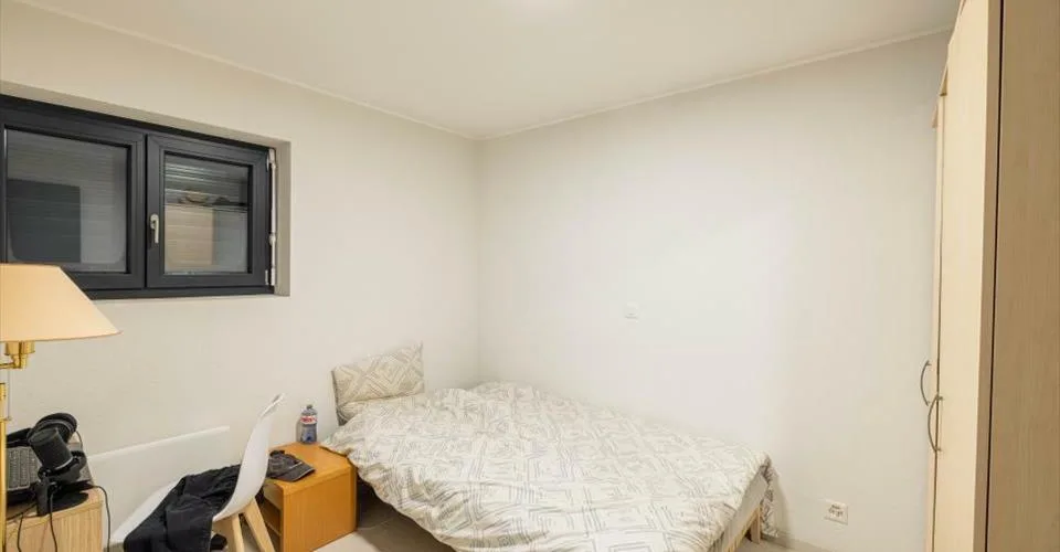 Immeuble avec revenus stables – logements, commerce et parking – Foto 9 von 13