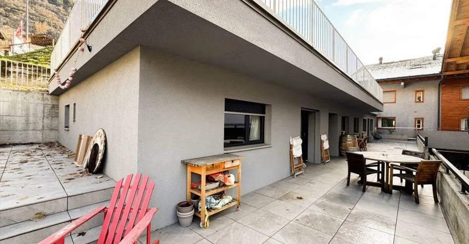 Immeuble avec revenus stables – logements, commerce et parking – Foto 2 von 13