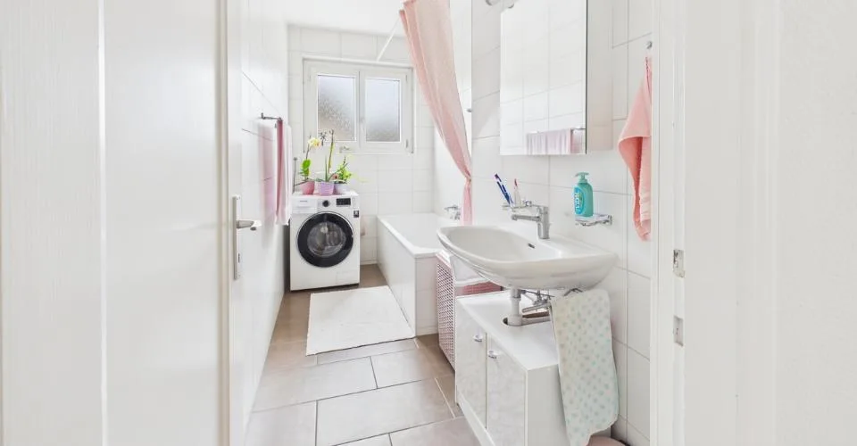 À vendre à Delémont : immeuble mixte comprenant 6 logements et 1 commerce – Foto 6 von 13