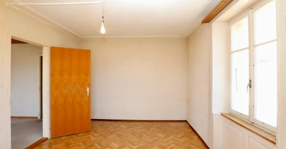 Immeuble mixte de 3 appartements et locaux artisanaux à Porrentruy