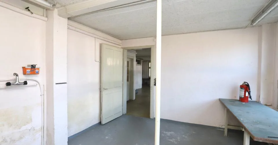 Immeuble mixte de 3 appartements et locaux artisanaux à Porrentruy