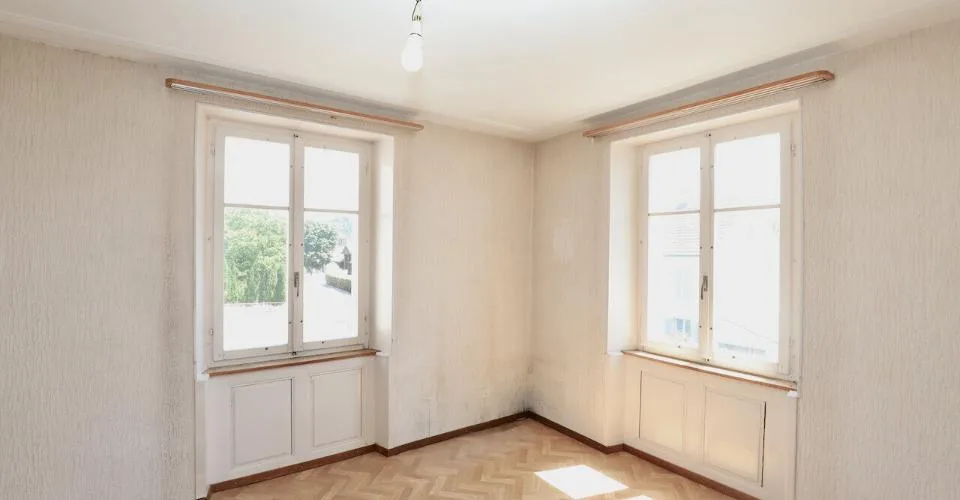 Immeuble mixte de 3 appartements et locaux artisanaux à Porrentruy