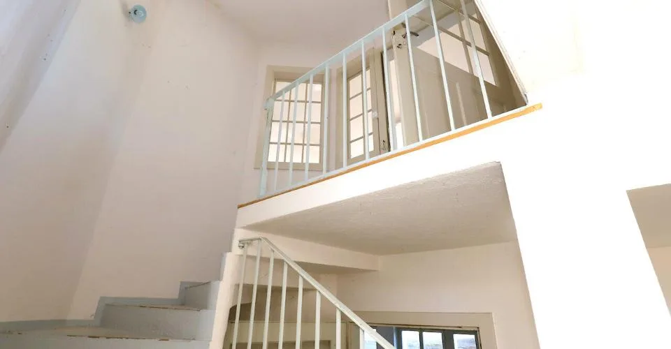 Immeuble mixte de 3 appartements et locaux artisanaux à Porrentruy