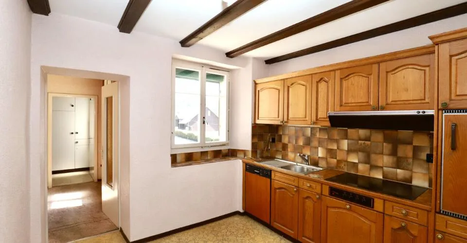 Immeuble mixte de 3 appartements et locaux artisanaux à Porrentruy