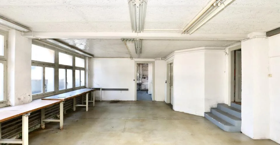Immeuble mixte de 3 appartements et locaux artisanaux à Porrentruy