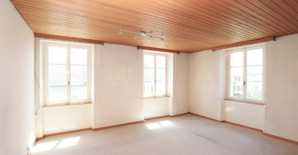 Immeuble mixte de 3 appartements et locaux artisanaux à Porrentruy