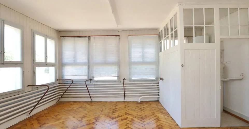 Immeuble mixte de 3 appartements et locaux artisanaux à Porrentruy