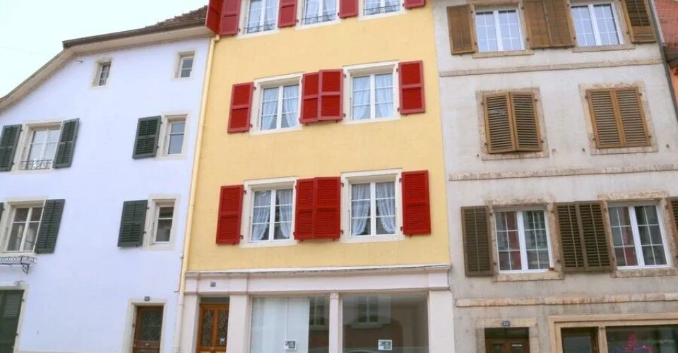 Immeuble de 2 logements, 1 studio et 1 bureau à vendre à Porrentruy