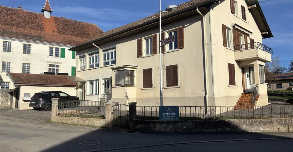 Bâtiment de deux logements et atelier situé à Bonfol