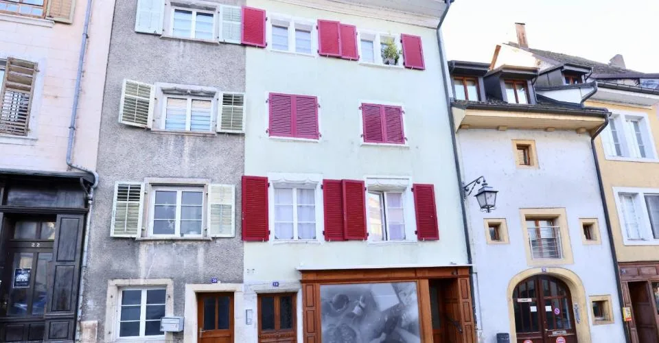 Immeuble de rendement de 4 logements et 1 commerce à vendre
