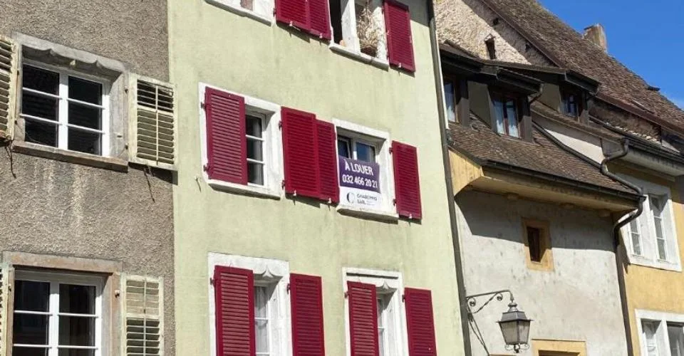 Immeuble de rendement de 4 logements et 1 commerce à vendre