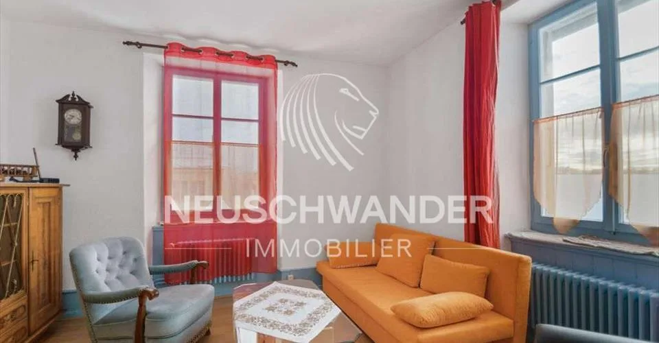 Immeuble de 4 logements et 3 commerces à vendre à Saignelégier