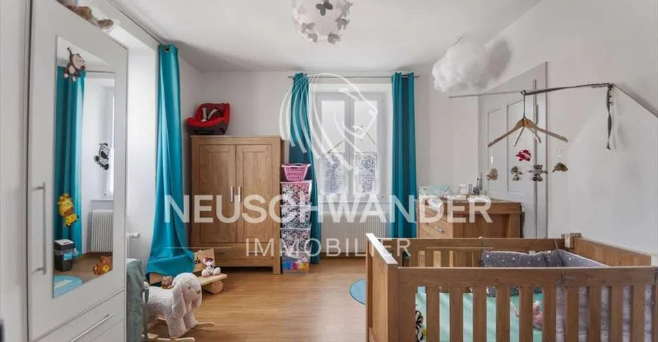 Immeuble de 4 logements et 3 commerces à vendre à Saignelégier
