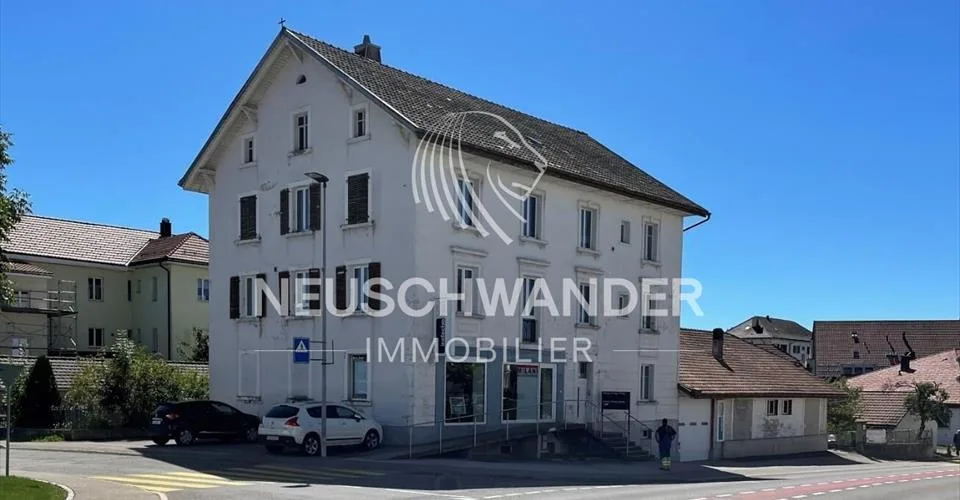 Immeuble de 4 logements et 3 commerces à vendre à Saignelégier