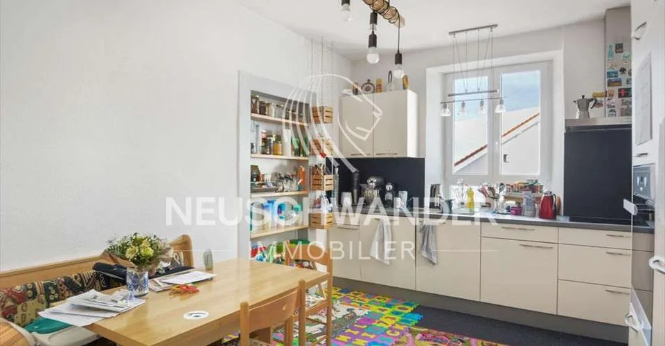 Immeuble de 4 logements et 3 commerces à vendre à Saignelégier