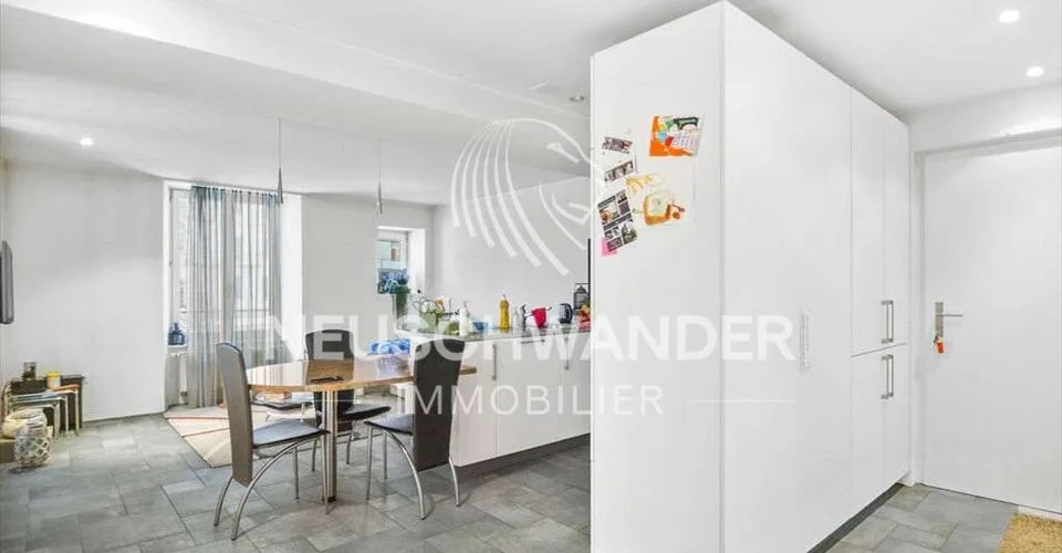 Immeuble de 4 logements et 3 commerces à vendre à Saignelégier