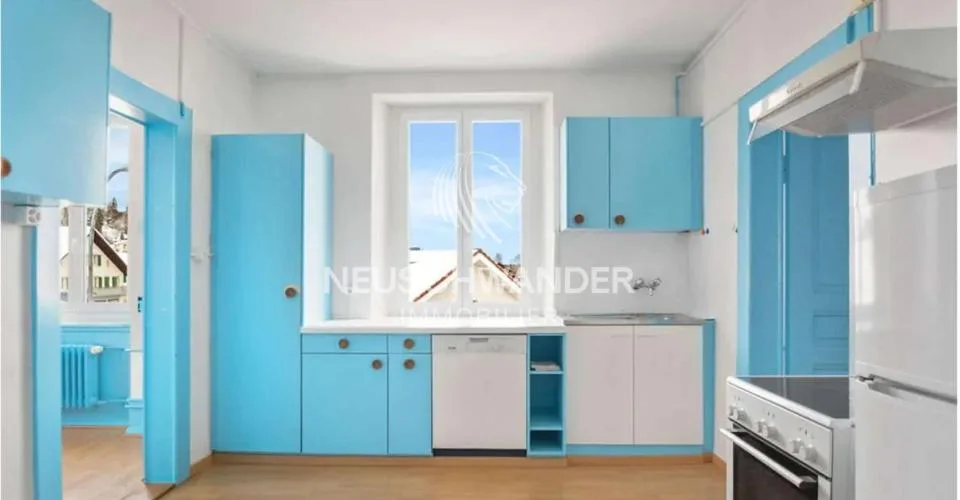 Immeuble de 4 logements et 3 commerces à vendre à Saignelégier