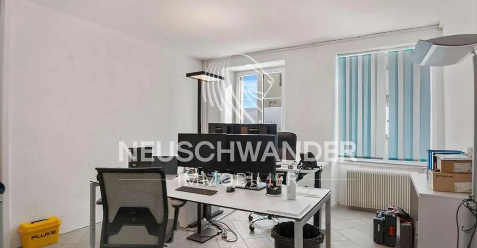 Immeuble de 4 logements et 3 commerces à vendre à Saignelégier
