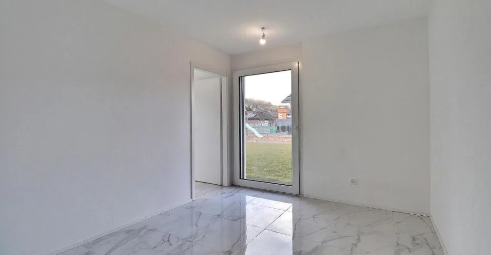Appartement 4.5 pièces en rez-jardin à Moudon