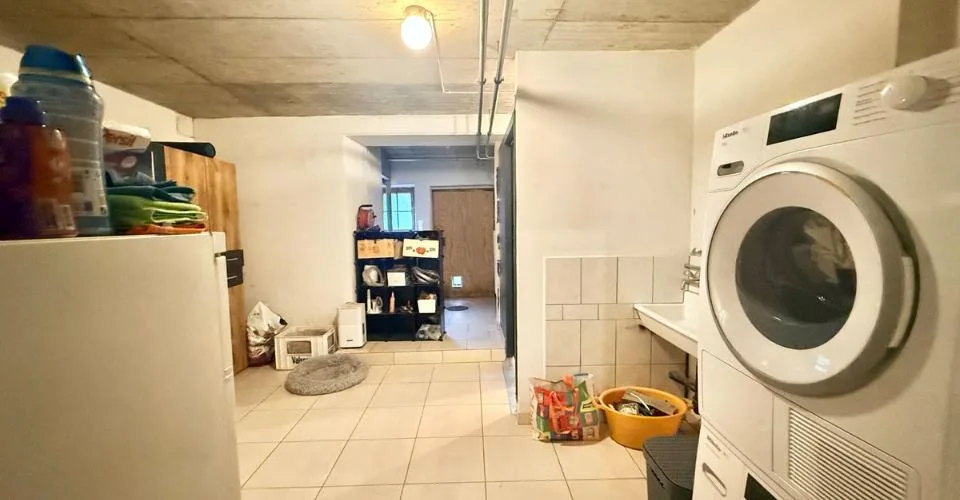 Espace mixte avec appartement 2,5 pièces et atelier - Centre de Tramelan