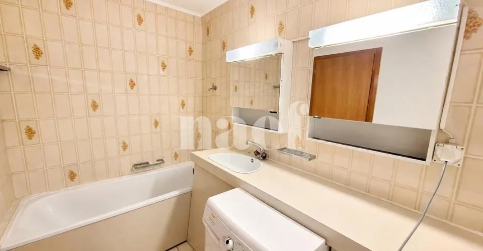 Appartement de 4 pièces au 1er étage avec 2 balcons