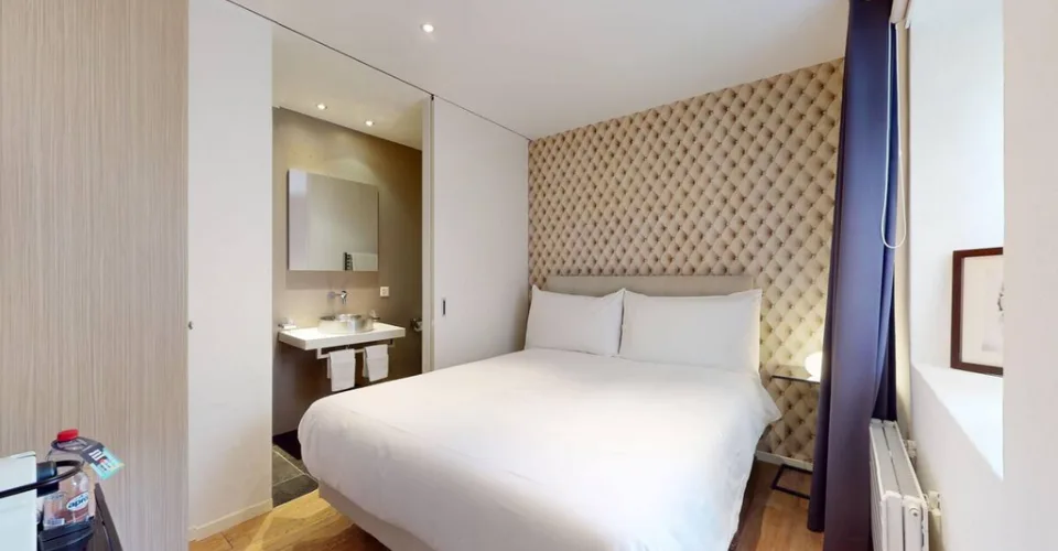 Chambre idéalement située dans immeuble au bord du lac
